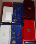 A group of South African eight coin boxed proof sets, various dates eight sets, a 1963 set, two