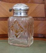 A George V silver lidded amber flash cut glass scent jar, makers mark rubbed, London, 1931, 16.5cm.
