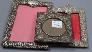 Two silver mounted photograph frames, Chester, 1899, 24.6cm & Birmingham, 1900 and a plated frame.