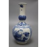 A Chinese blue and white bottle vase, height 22cmCONDITION: Typical minor flaws in manufacture,