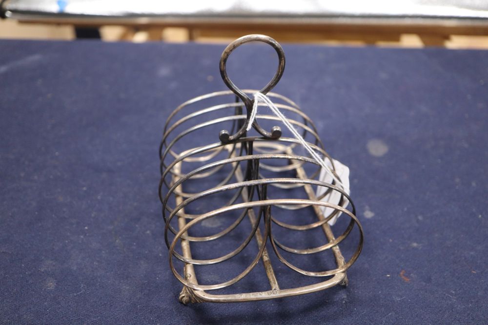 A Victorian silver seven bar toastrack, William Evans, London, 1865, height 13.5cm, 70z.CONDITION: - Image 2 of 4