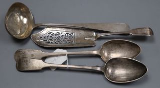 A pair of Victorian silver fiddle pattern basting spoons, London, 1844, A similar silver fish