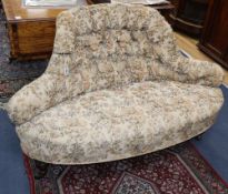 A Victorian walnut upholstered conversation seat (one section of original) W.130cm, D.64cm, H.78cm