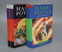 Two Harry Potter books: Harry Potter and the Half Blood Prince and Harry Pottery and the Deathly