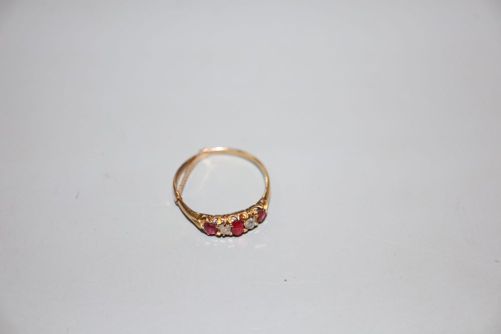 A yellow metal, ruby and diamond set five stone half hoop ring, size P, gross weight 2.2 grams. - Image 2 of 3