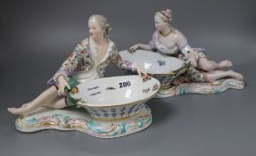 A pair of 19th century Meissen figural baskets, one numbered 2863, the other 2858CONDITION: One