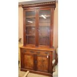 A late Victorian mahogany bookcase cupboard, W.118cm D.50cm H.240cm