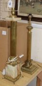 Two brass and onyx Corinthian column lamps, tallest 60cm