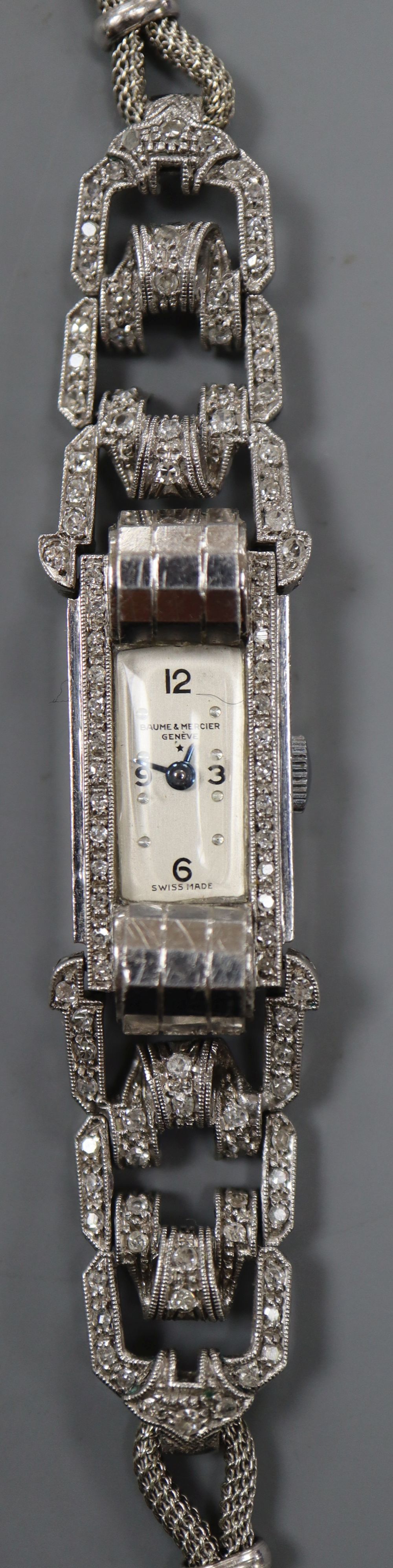 A lady's 1950's white metal (stamped Plat) and diamond set Baume & Mercier manual wind cocktail