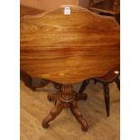 A Victorian mahogany folding oval topped breakfast table, W.100cm, D.70cm, H.70cm