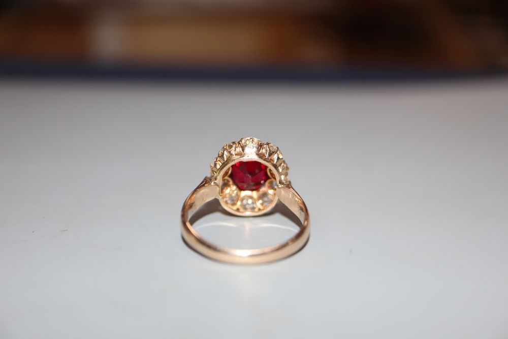 An early-mid 20th century yellow metal, red doublet and diamond set oval cluster ring, size K, gross - Image 3 of 3