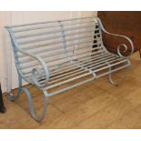 A Victorian painted wrought iron garden bench, W.122cm D.55cm H.74cm