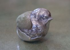 An Edwardian novelty silver mounted pin cushion modelled as a hatching chick, Sampson Mordan & Co,