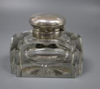 A George V silver mounted shaped cut glass inkwell, Alexander Clark * Co Ltd, Birmingham, 1917,