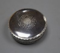 A 20th century Persian white metal and niello circular box and cover, 8cm, gross 3oz.CONDITION: