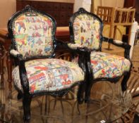 A pair of ebonised child's armchairs, with spiderman upholstery, W.50cm H.70cm