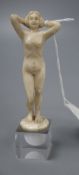 An Art Deco ivory carving of a female nude, unsigned, height 12cm