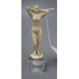 An Art Deco ivory carving of a female nude, unsigned, height 12cm