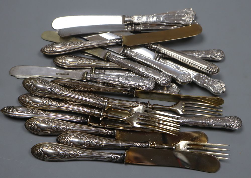 Five pairs of Persian white metal handles fruit knives & forks and twelve silver handled cake