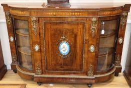 A Victorian ormolu mounted marquetry inlaid walnut credenza, inset with Sevres style porcelain