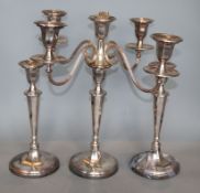 A pair of 1960's silver candlesticks by Roberts & Belk, Sheffield, 1968, 25.4cm, weighted and a