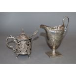 An early 20th century German pieced silver mustard pot with liner, London import marks for London,