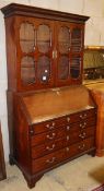 A George III mahogany bureau bookcase, W.107cm, D.56cm, H.196cmCONDITION: Overall has a good rich