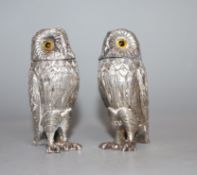 A pair of novelty silver pepperettes, modelled as owls, William Comyns & Sons Ltd, London, 1958,