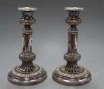 A pair of old Sheffield plate candlesticks