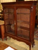 A Victorian mahogany bookcase cabinet on stand, W.158cm, D.34cm, H.175cmCONDITION: Cornice is