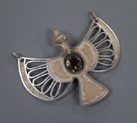 A stylish white metal and smoky quartz set drop 'bird' pendant, signed en verso 'Guayashamin', width