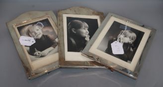 A pair of silver photograph frames, London, 1928 (one set of marks rubbed), 26.8cm and one other