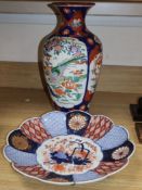 An Imari vase, height 41cm and a dishCONDITION: The dish has a clay shard still attached to the