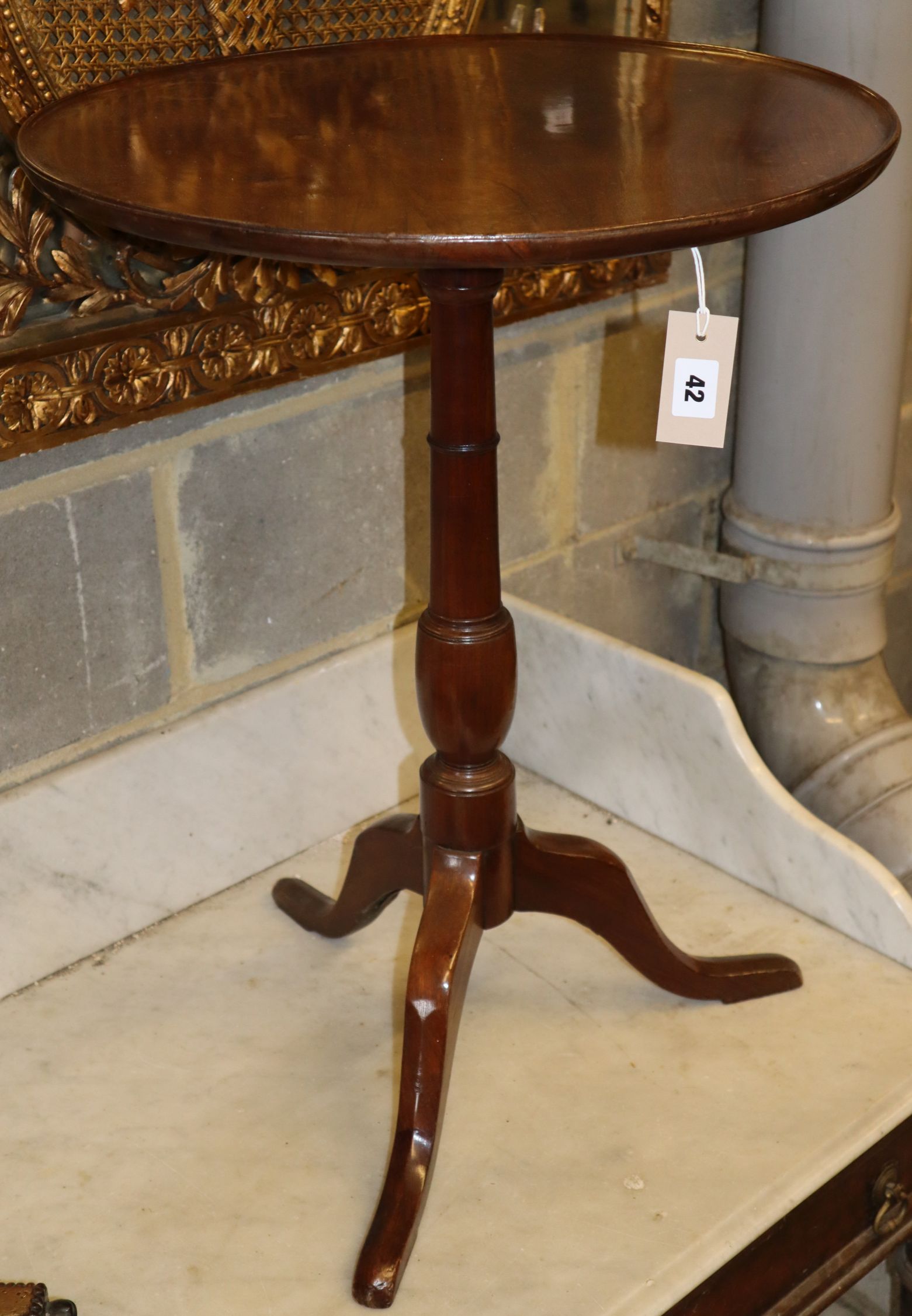 A 19th century mahogany tripod wine table, Diameter 52cm, H.70cm