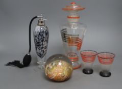 An Art Deco decanter, height 27cm, two glasses, a glass paper weight and a scent bottle