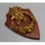 A 19th century Bacchus ormolu door knocker, on shield mount