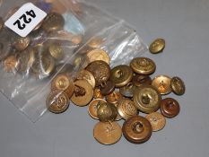 Assorted military badges and buttons