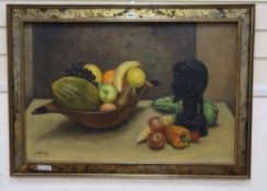 G. Karlin, oil on canvas, Still life of fruit and an African bust on a table top, signed and dated