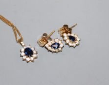 An 18ct gold, sapphire and diamond oval cluster pendant on 18ct gold fine chain and a similar pair