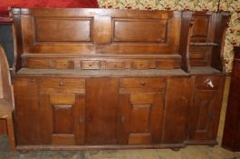 An 18th century Continental walnut dresser, W.214cm, D.40cm, H.148cm