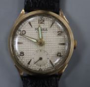 A gentleman's 1950's 9ct gold Majex manual wind wrist watch, on leather strap.CONDITION: Case