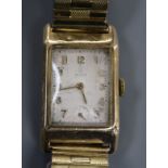 A gentleman's 1940's 9ct gold manual wind wrist watch, dial signed Tudor, with case back