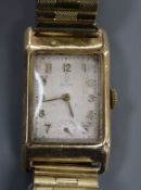 A gentleman's 1940's 9ct gold manual wind wrist watch, dial signed Tudor, with case back