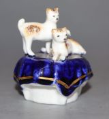 A rare Staffordshire porcelain 'kittens' inkwell, c.1840-50, H. 6cm