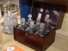 A Victorian plated cruet and a 19th century mahogany and mother of pearl inlaid decanter box, six