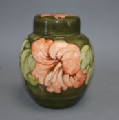 A Moorcroft hibiscus pattern jar and cover, height 20cmCONDITION: There is crazing to the glaze