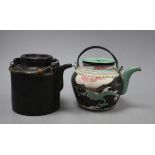 A Chinese enamelled Yixing teapot, height 13cm and a black Yixing teapot