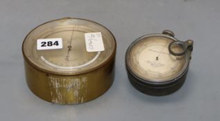 A Short & Mason surveying aneroid precision barometer and a P. Casartelli aneroid barometer,