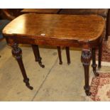 A Victorian walnut card table (one leg in need of restoration), W.96cm, D.52cm, H.75cm