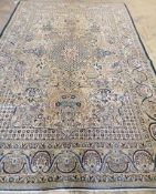 A Qum carpet, 319 x 212cm